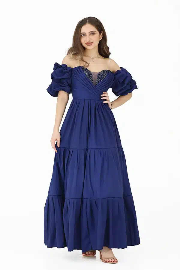 فستان طويل فوشية بأكمام نص منفخه